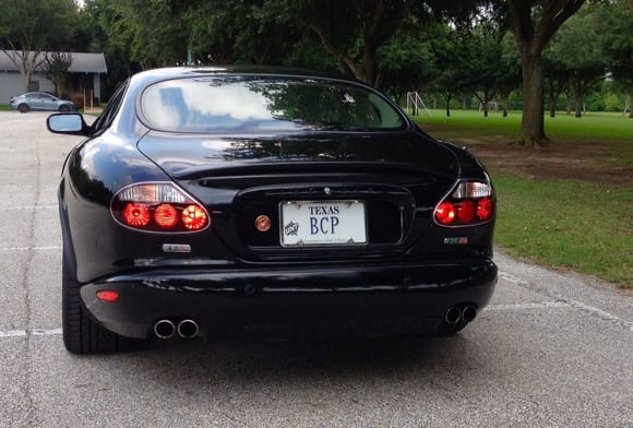 2005 XKR Coupe with "Victory-Edition" Tail Lights and LED Bulbs...as viewed from a Silver Porsche