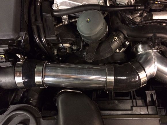 Both 45 degree couplers have about 1.5" of length on each end cut off to get the pipes to lay correctly and clean up the excess silicone overlap