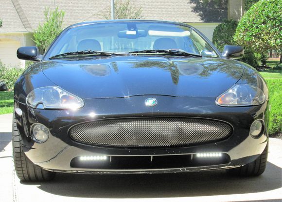 2005-2006 XKR Front Nose-Piece (Bumper) with Day Time Running Lights in lower opening and Mesh Grill