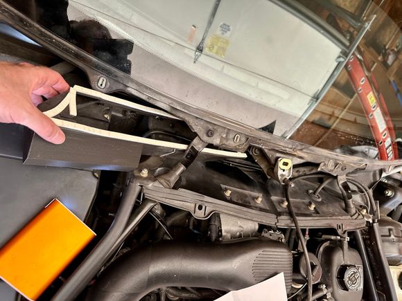 Inserting it face down and then tipping it back up once in there seemed to work best.