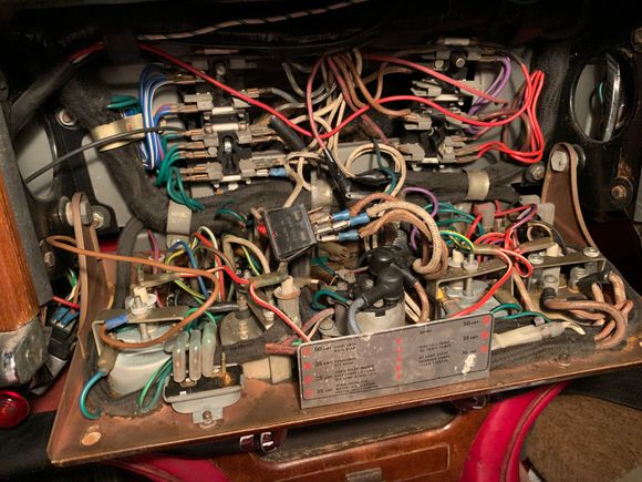 The mess of wires behind the dash board, switch added to by pass ignition.  