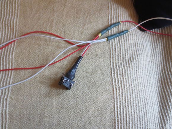 Close up showing one in and three out of the step down connector