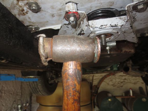 Before final tightening, knock the bracket about with a hide hammer to centralise it on the gearbox rod