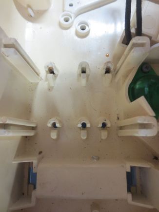 Plastic protrusions pinched off for easier fitting of the soldered board