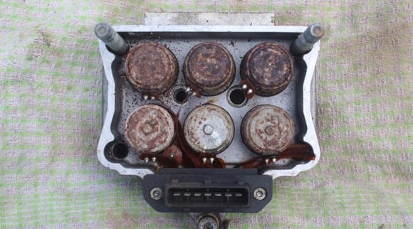 In this Old ABS Valve Block you can see the Ribbon Connectors which over time get Crispy with heat and can break through vibration and they can also get rusty if you don't change the Brake Fluid on a regular Basis