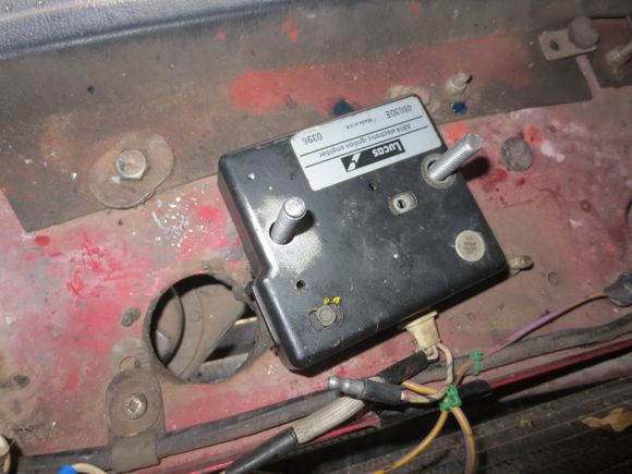 earth wire to LHS rad crossmember earth bolt. All the coil/tacho/dizzy signal wires run to the engine using ordinary wires in wrap.