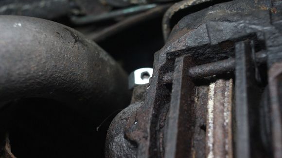 Drilled Nut with the Hole in placed over the Brake Bleed Nipple already for 'Spot Welding'