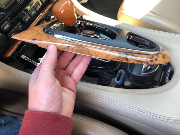 Shifter trim prys up for removal.