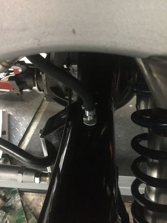 Breather at top of left differential tube