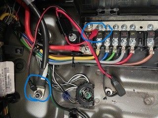 Blue circles show where to attach leads.  When you remove nut for ground hold the ground cable down so that contact is retained - save you from having to reset windows.