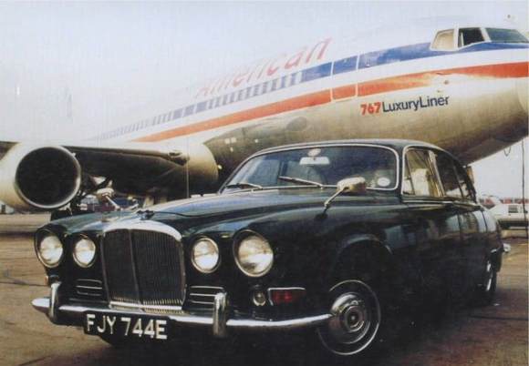 My 420 in a publicity photo next to my airplane at Manchester, England.  It was bought in pieces in 1986 & restored near MAN.