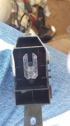 After removing greu rubber and circuit board, this is inside of switch. IMPORTANT do not invert. There are 2 black plastic plungers loose.