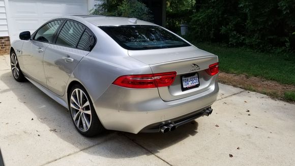 Had the rear diffuser modded and quad finishers added