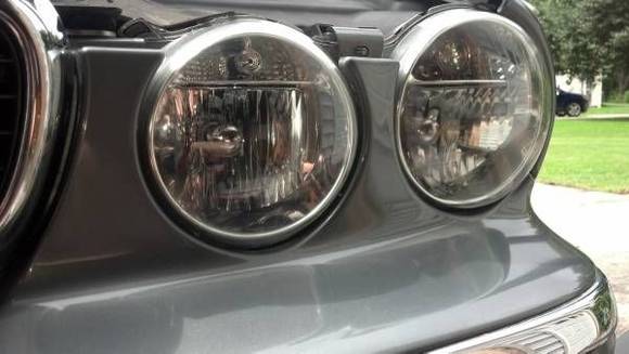 Refinished R side headlight lenses to remove the cloudiness. I added a materials list, procedures, and step-by-step How-To for anyone who's interested.