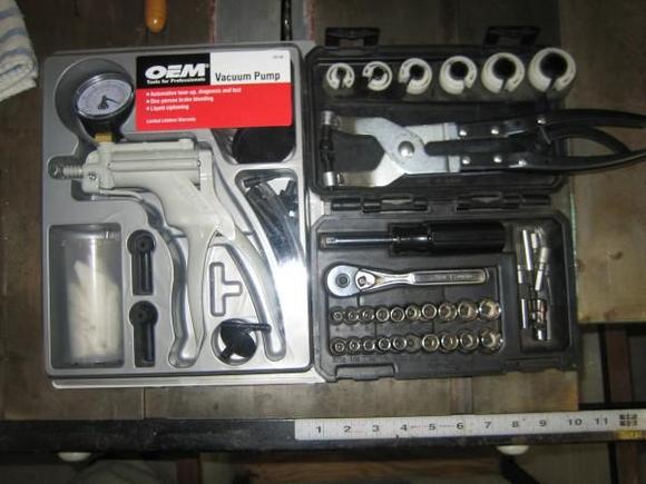 Tools required: Vaccuum Pump, Dremel with cut off wheel, fuel line clamp release thingy's, ratcheting clamp tool for spring  clamps,  small metric socket kit, Heat gun, 8-10 16 penny finishing nails. And about 6 hours at a beer pace.