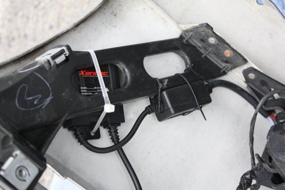 The ballast and support box mounted to the internal supports for the bumper cover.  Convenient place to mount things and keeps all the wires on the bumper cover for easy removal later.