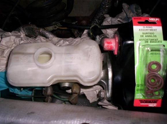 Brake reservoir leaked, fixed by replacing reservoir with a non-warped used one and using these HELP! brand Viton o-rings to seal between res and master cylinder.