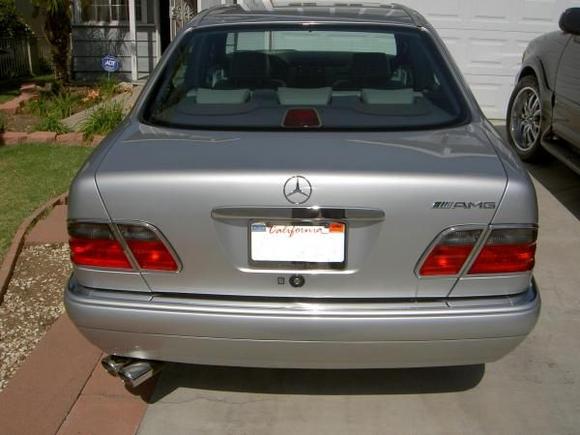 Upgraded the lights to the 02 style with chrome rings.  I also added a chrome boot finisher, an AMG exhaust system and after getting the engine upgraded I finaly added the AMG badge.