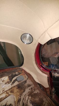 One of the more tricky parts - installing the rear interior lights. Takes guts and a sharp probe to cut holes in your nice new headliner. I found a sharp probe was the best way to locate the screw holes. I used a little spray adhesive on the vertical pieces, may not be required if you remove the window (like you're supposed to)