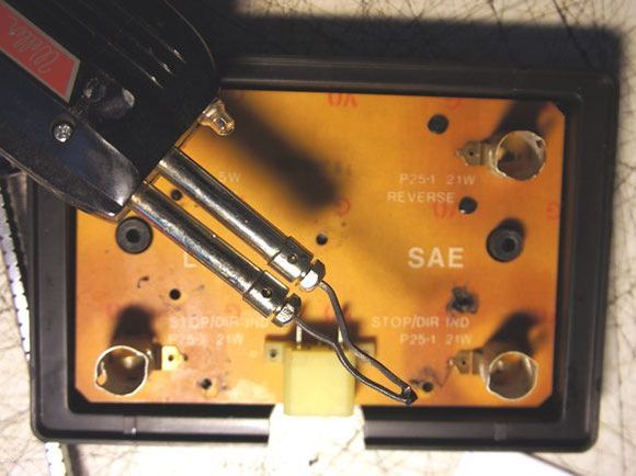 Melting plastic nipples to release circuit board