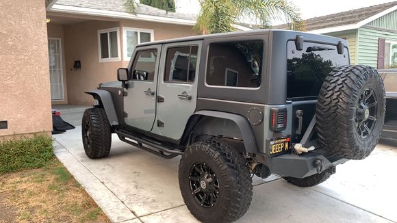 the spare tire is in new condition / Smittybilt XRC side-step rails