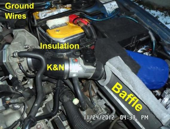 Baffle keeps hot air from entering intake and is sealed up to hood. Extra Blue Filter is for water proofing---i use it in winter and when going thru car wash. Battery is insulated to keep hot and cold air off (makes a huge difference). Extra Ground Wires are beneficial.