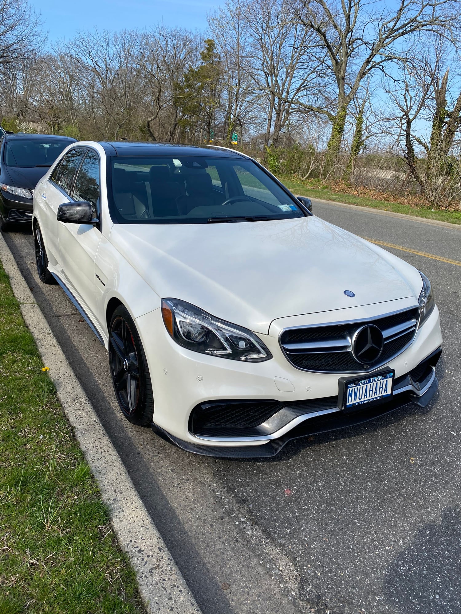2014 Mercedes-Benz E63 AMG S - 2014 E63s Diamond White w/factory CF package. Dealer maintained and daily driven - Used - VIN WDDHF7GB2EA997897 - 58,000 Miles - 8 cyl - AWD - Automatic - Sedan - White - Babylon, NY 11702, United States
