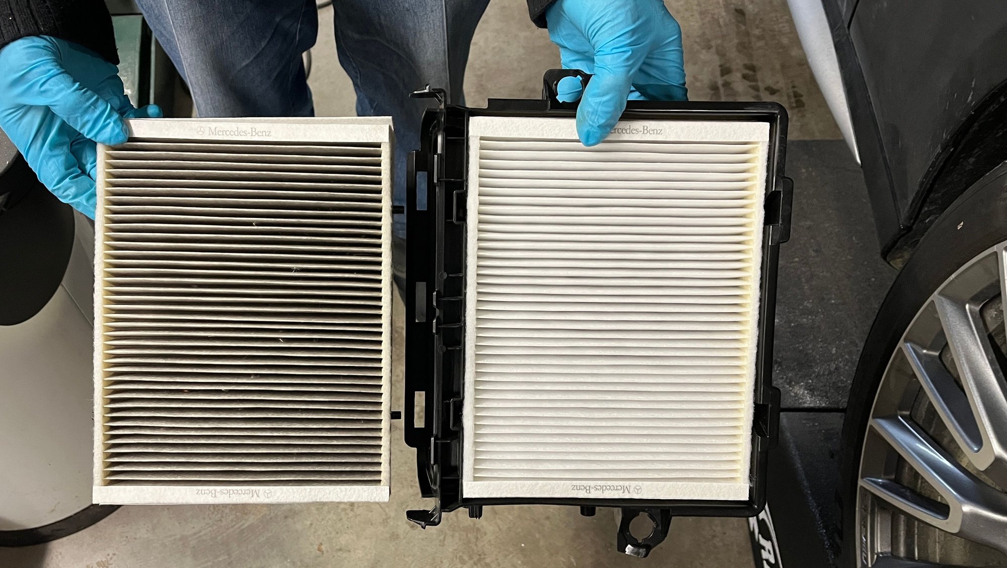 New dust filter installed in housing cover above 12v battery at 19K miles.