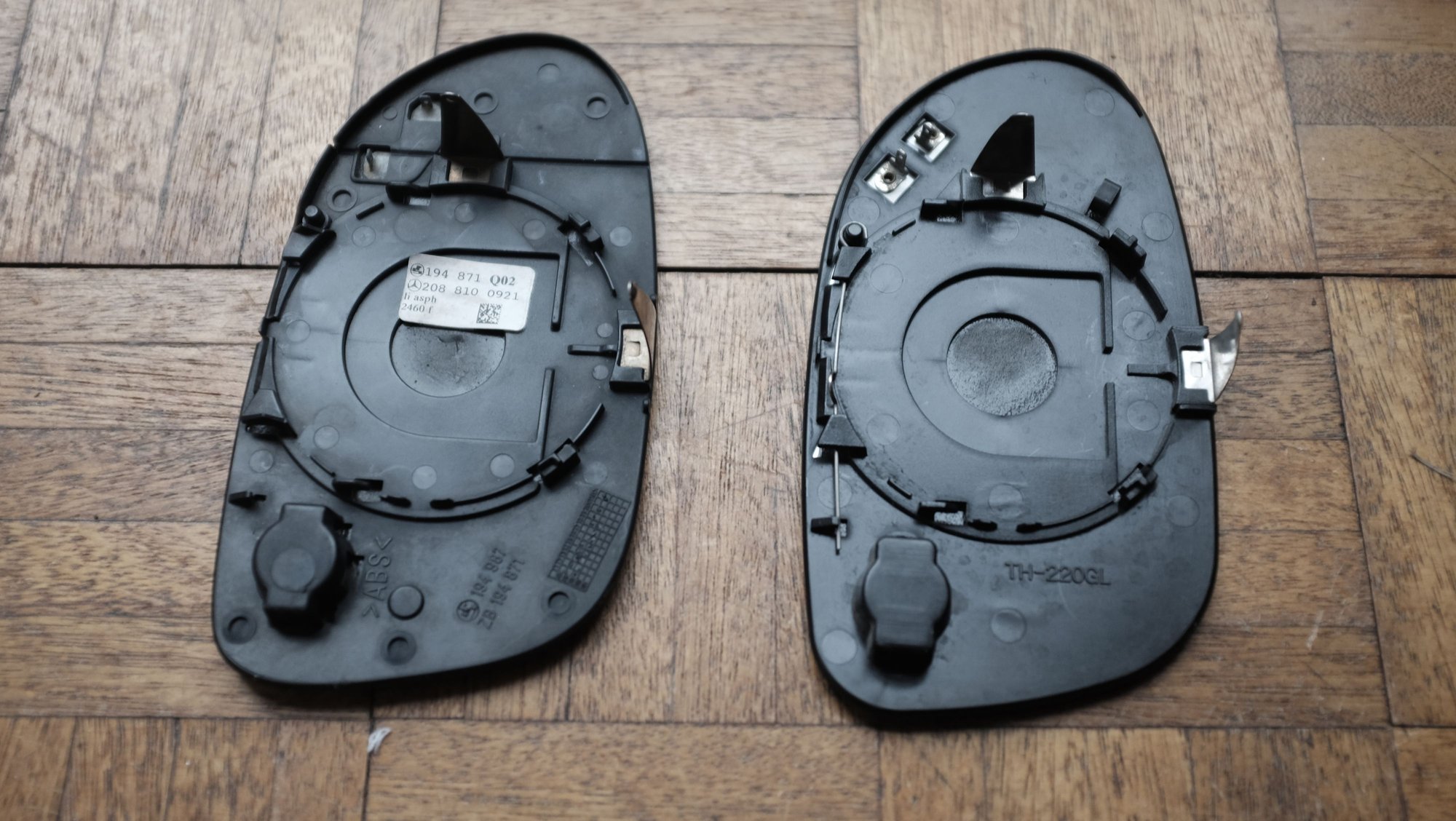 The one on the right is the replacement but does not have the same markings/numbers as the original, otherwise it looks identical.