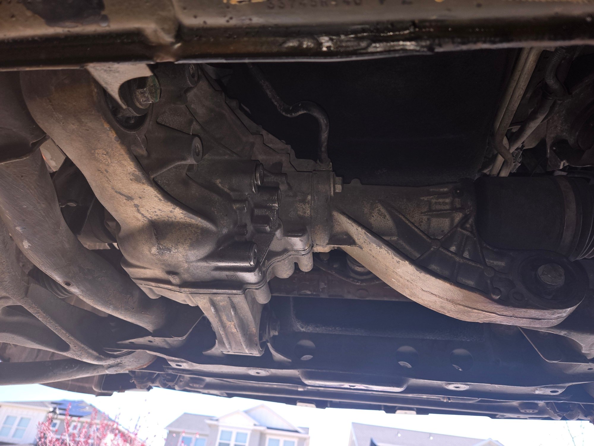 The end of the right hand side CV Drive Shaft extends deep into the differential housing