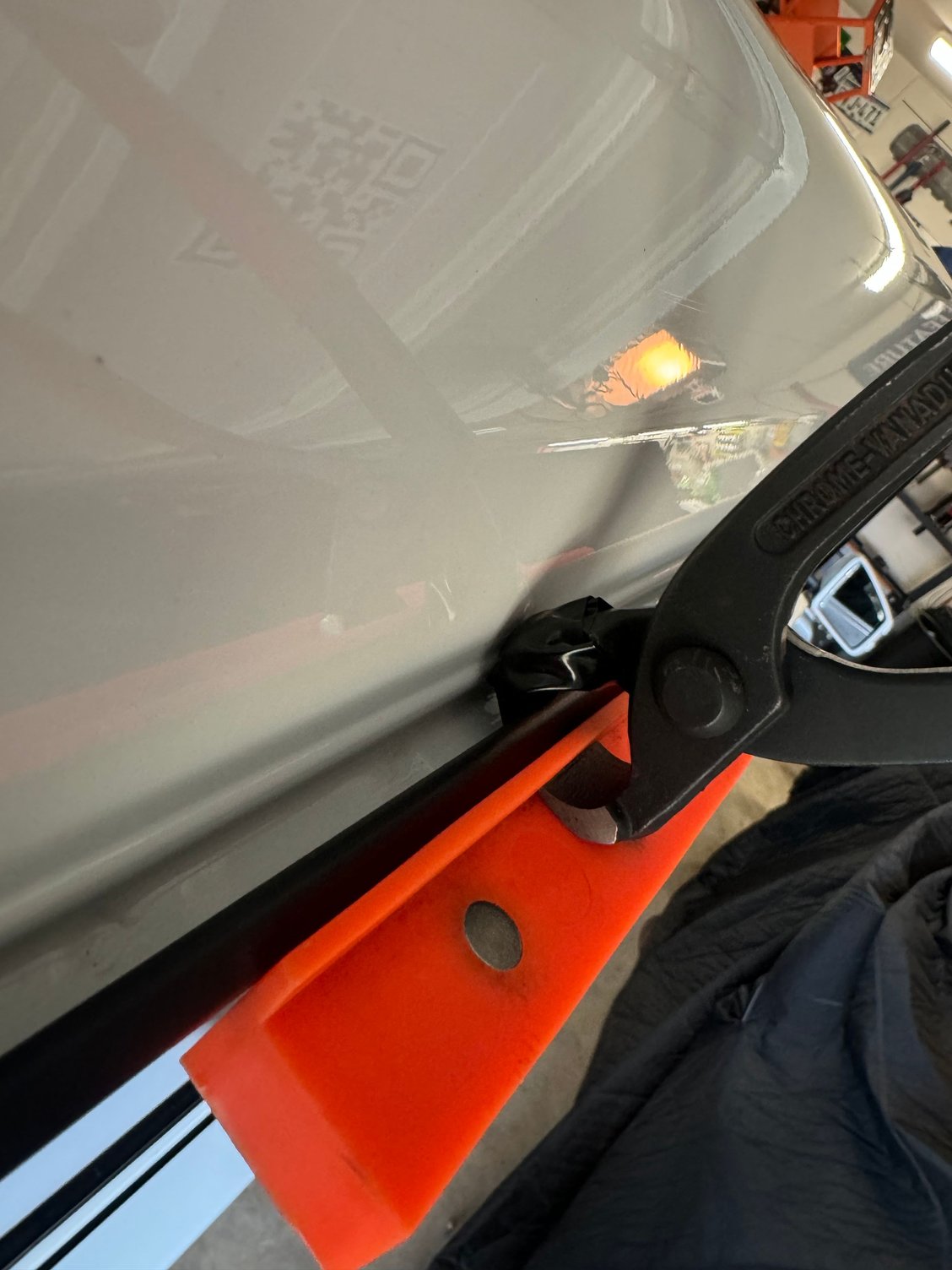 I wrapped tape around the side of the pliers that was coming close to the paint. This helps with more protection.
