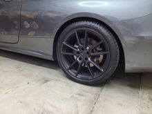 17mm spacers in rear on 19" factory rims and ride height.