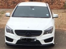 This is a 2014 Mercedes Benz CLA 180