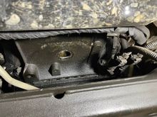 This is a picture looking forward at the bell housing. There is a small (1.25”) hole but no rubber cover like the picture shows in WIS. 

Is that image for a 2012 or 2013?  I have ordered a drive with WIS but won’t get it for a week. 
