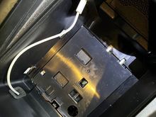 W214 console with cup holders removed.
