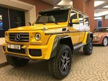 Golden yellow Mercedes-Benz G500 AMG 4x4² spotted at the Mall of Emirates.