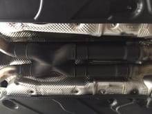 This is under the center of your car, that is what the Magnaflow pipe looks like after the oe piece has been removed.  My shop painted with high temp paint