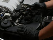 Loosen the oil cap with 17mm socket if needed. Removal of oil cap is important to improve flow.
