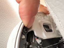 And here’s that screw you’ll remove to completely detach the trim from the seat and airbag assembly. Once you remove this screw (and the one from above that was broken on my trim) you will completely detach it from the seat. That’s it! 