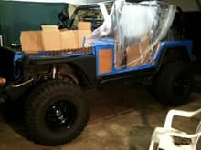 Work in process- Tape off all suspension components and bedline entire frame/wheel wells/rails/fenders.