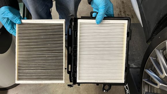 New dust filter installed in housing cover above 12v battery at 19K miles.