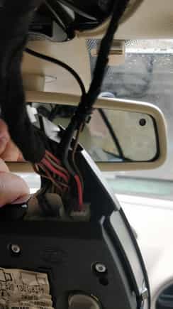 Tap into the red wire that is a 12VDC line feed, that stays powered for 10secs after you lock the car.