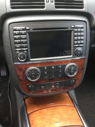 Note that you lose the wood trim above the radio. You do get a bigger screen though.