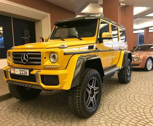 Golden yellow Mercedes-Benz G500 AMG 4x4² spotted at the Mall of Emirates.