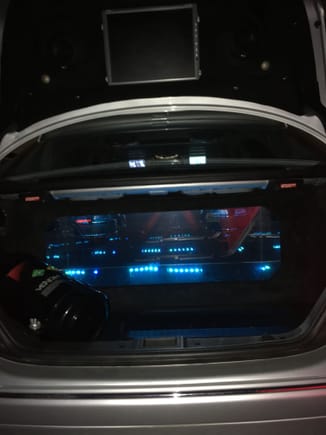 2 12" xtant x1001, mirror effect, tinted plexy on side & bottom w/2 xtant x 603 amps , remote multiple leds, tinted plexy, custom fiberglass pods, wrapped in suede mb quart mids, floating tv monitor w/ camera, remote multi-leds, black venom NOS, trunk enclosure all wrapped in suede