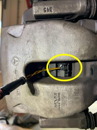 Figure 9: Brake wear sensor installed on right inboard brake pad. Next step is attaching the wear sensor connector to receptacle
