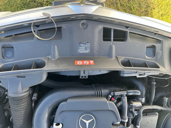 how do I remove the plastic cover right behind the grille where the  fresh air intake is connected i dropped a socket down there.