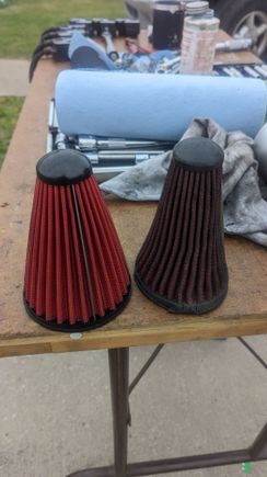 Old damaged air filter in backwards and new filter