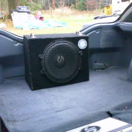 12&quot; pioneer 400 watt single sub in a modified enclosure, i also swapped out all of the stock speakers with durabrands, not the best, but they do the job