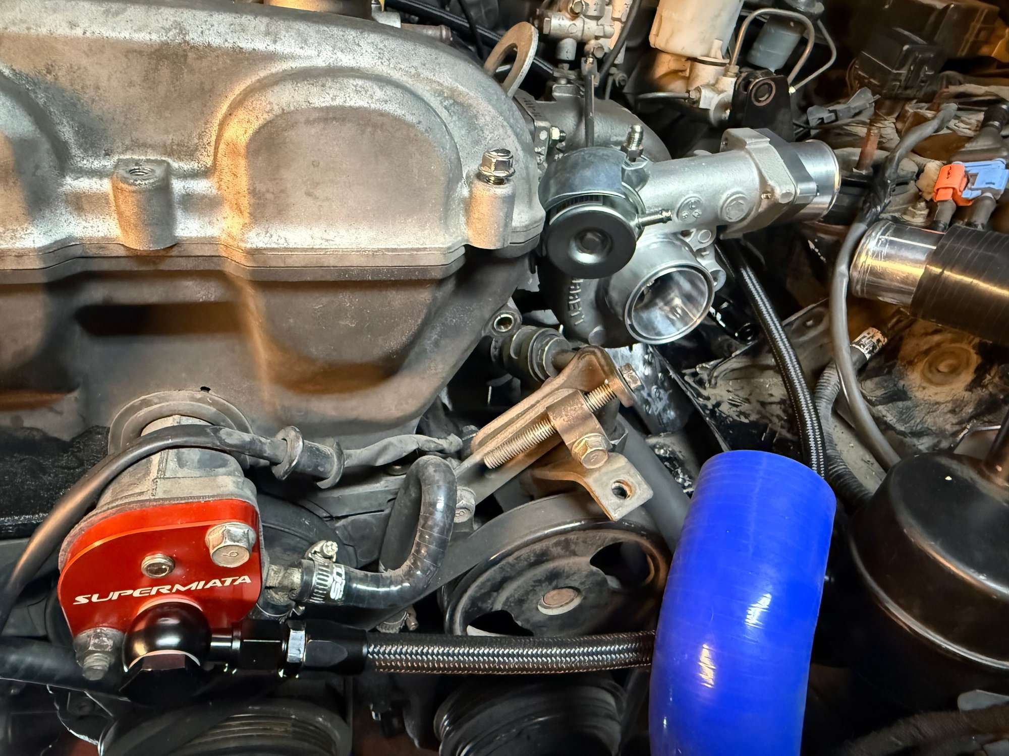 The water line port that comes from the front of the motor. 